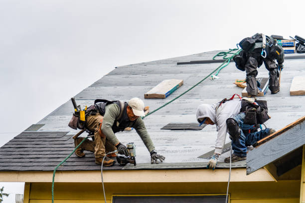 Professional Storm Damage Roof Repair technician working in Cocoa Beach, FL